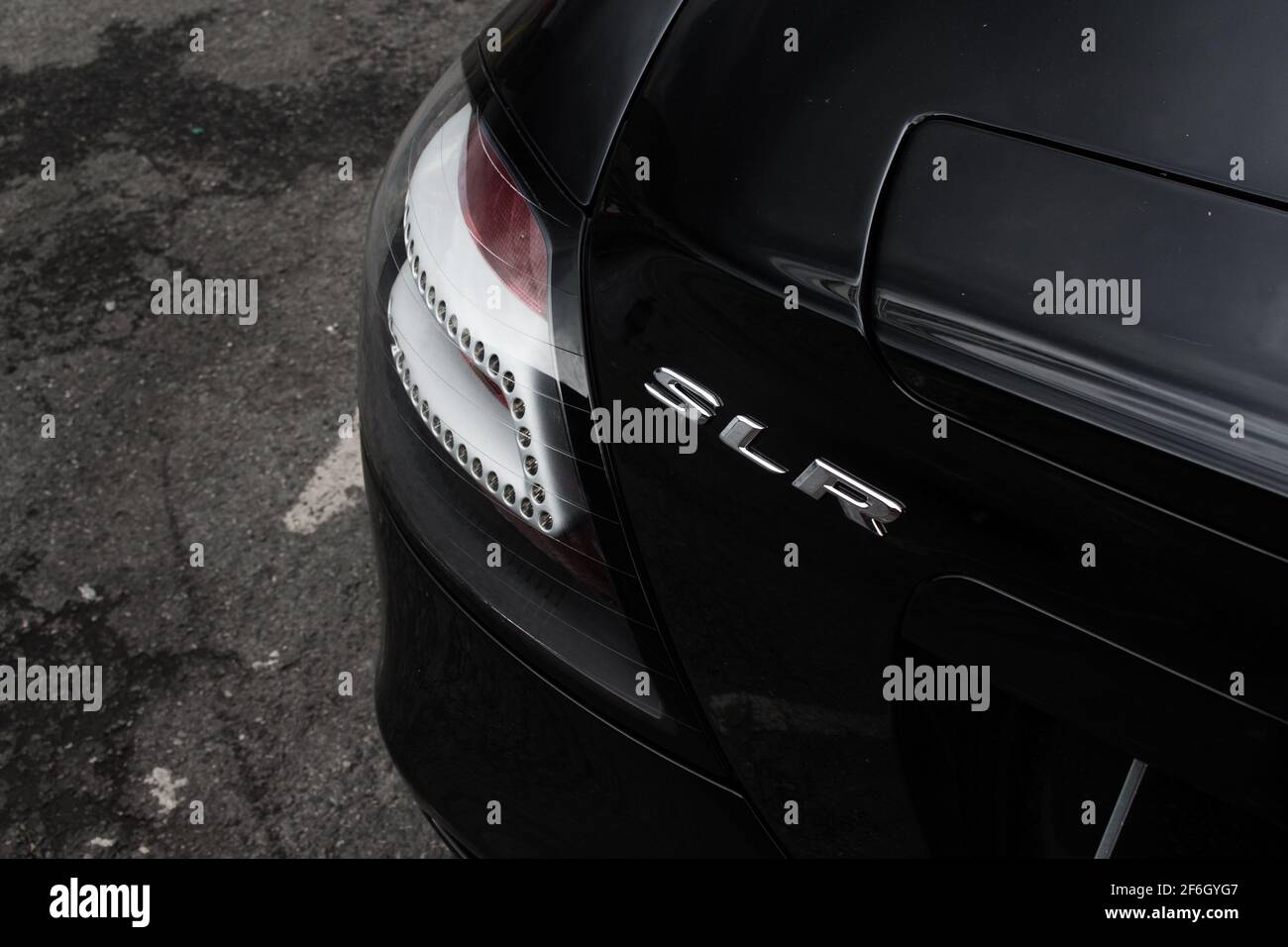 The Model Designation Badge On The Boot Lid Of A 2004 McLaren Mercedes SLR Stock Photo