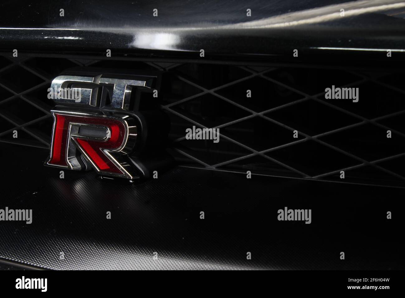 The Nissan GTR Logo On The Side Of The Front Grille Of The Car On A 2013 Nissan GTR R35 Premium Stock Photo
