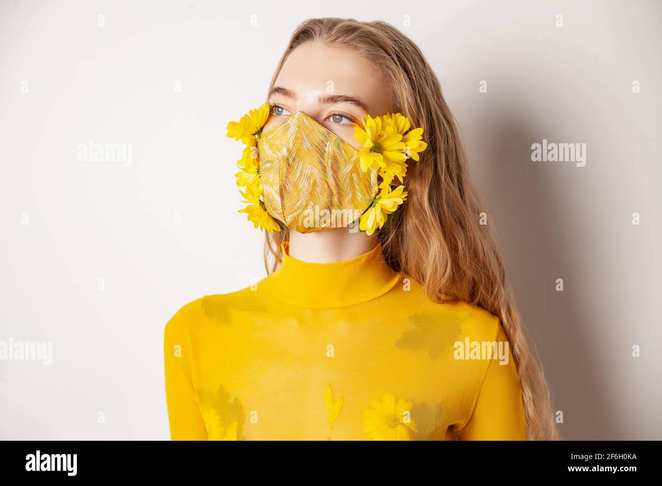 Charming woman in yellow hi-res stock photography and images - Alamy