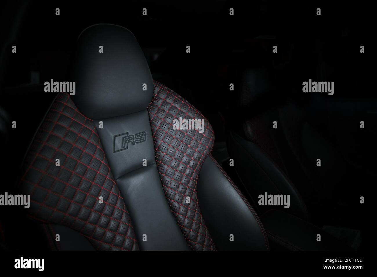 The Drivers Seat Of A 2017 Audi RS3 With Optional Red Diamond Pattern Stitching Stock Photo