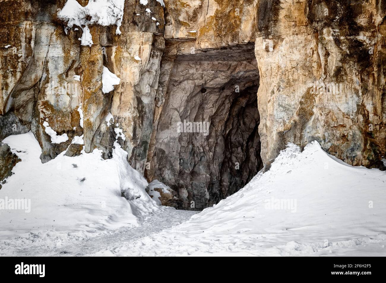 The entrance to the old abandoned limestone adits. Stock Photo