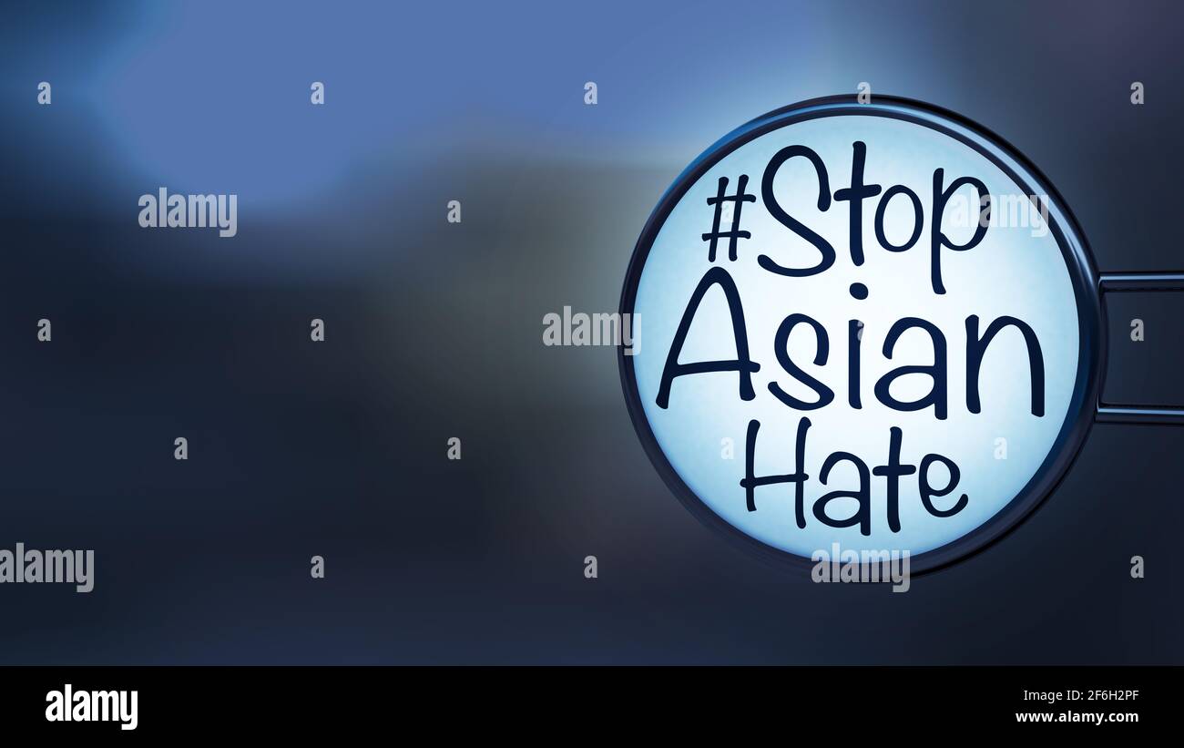 English texts “#Stop Asian Hate” on label in front of shop at night, concept for calling international community to stop hurting and hating Asian peop Stock Photo