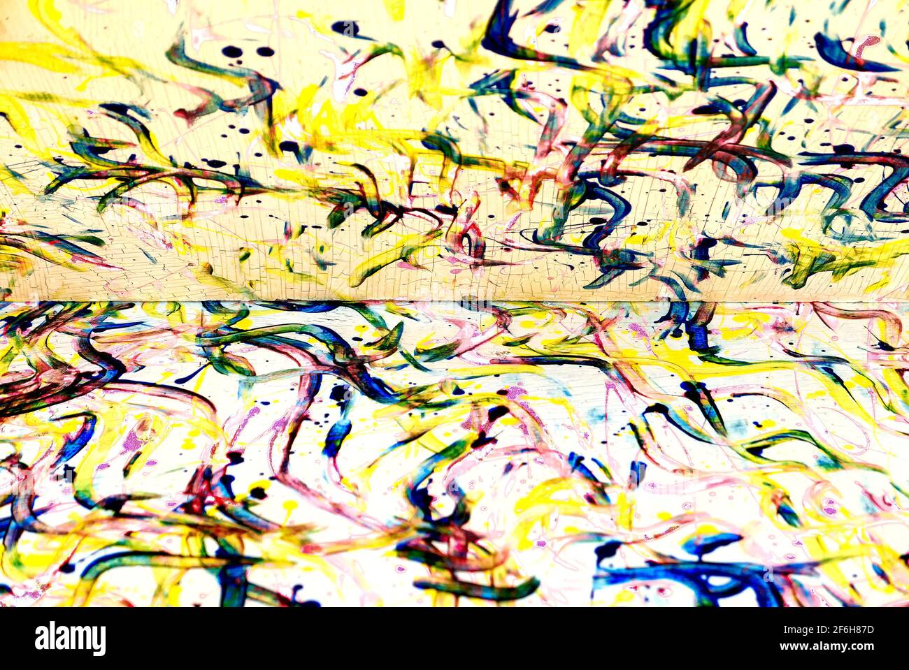 Abstract grunge color paint strokes like from finger painting on canvas, which is divided into half Stock Photo