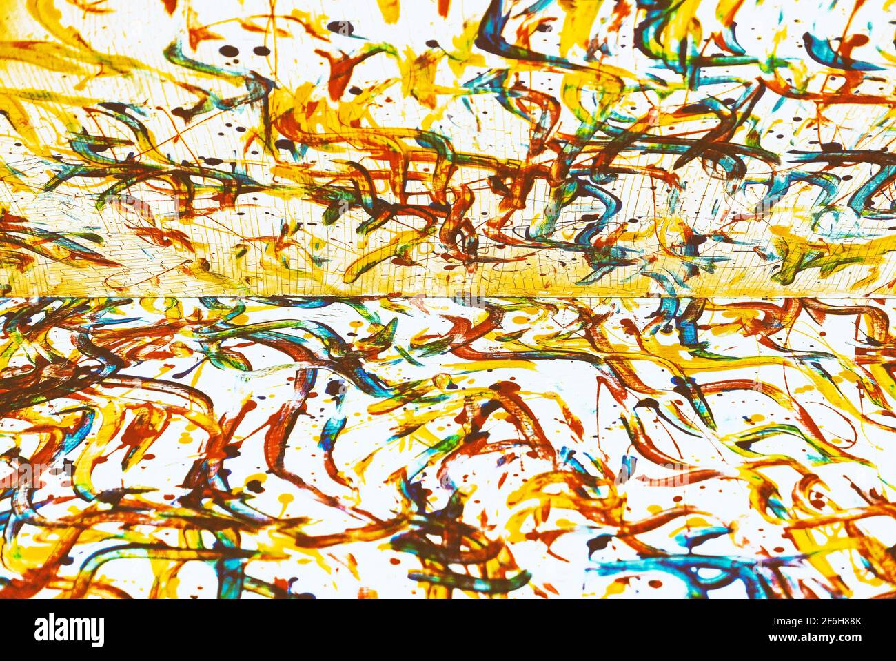 Abstract old style color paint strokes like from finger painting on canvas, which is divided into half Stock Photo