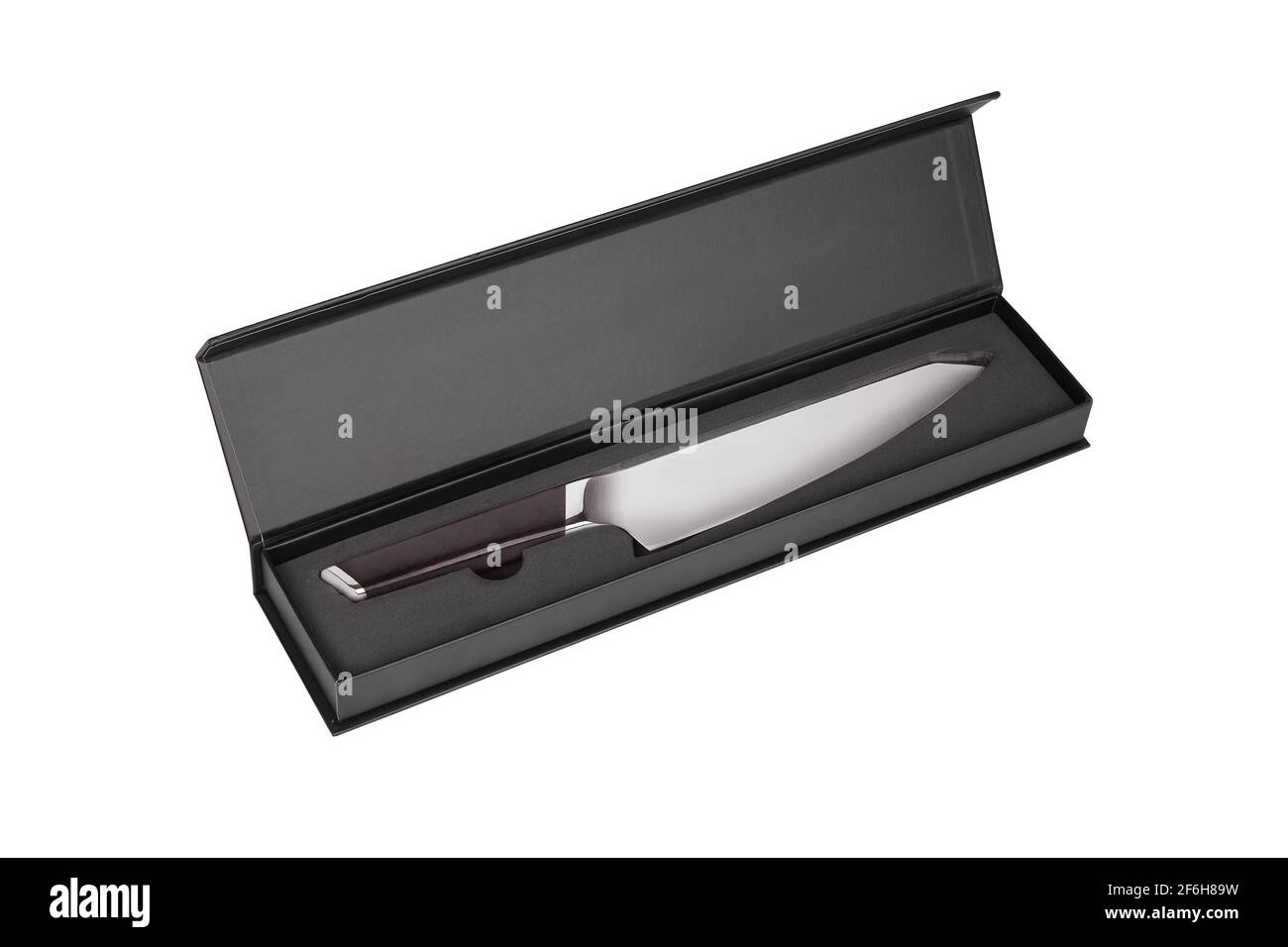 Carving knife with wooden handle in Black box isolated on white background. Knife for carving cooked meat into slices. Stock Photo