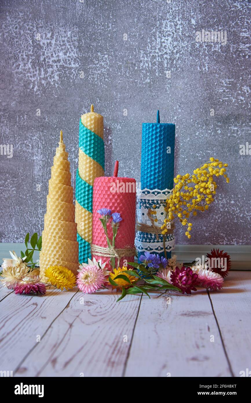 Decorative candles made of beeswax with a honey aroma for interior and tradition. Stock Photo
