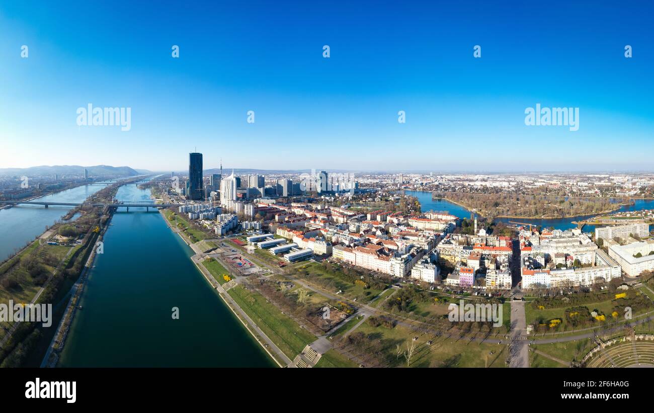 Vienna Danube and City aerial panoramic view. Donaustadt Kagran district and Kaiserwasser at the Danube. Modern city quarter with skyscrapers and busi Stock Photo