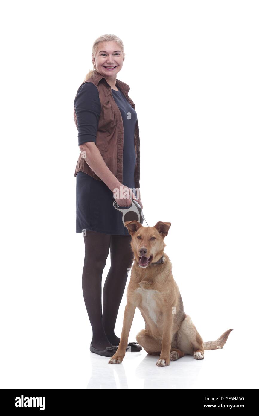 in full growth. female dog handler with a pet dog. Stock Photo