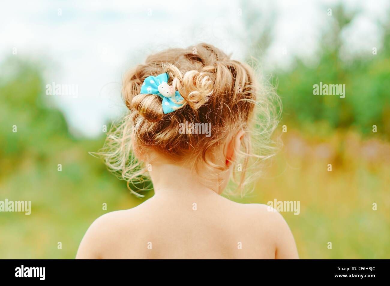 portrait of a happy little girl outdoors Stock Photo - Alamy