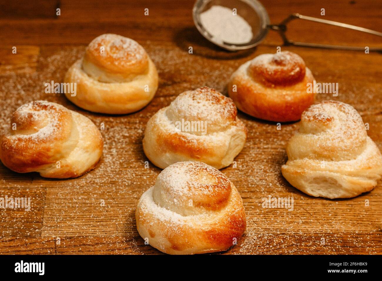 Traditional Easter baking served with honey at breakfast. Delicious homemade hot buns from sweet yeast dough,CZ jidase, traditionally baked in Czech Stock Photo