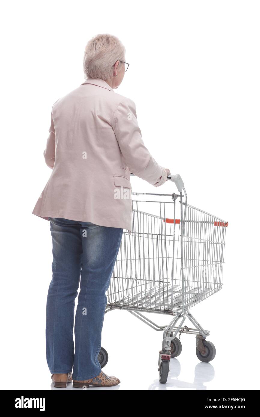 rear view. adult woman with a shopping cart looking at a white screen
