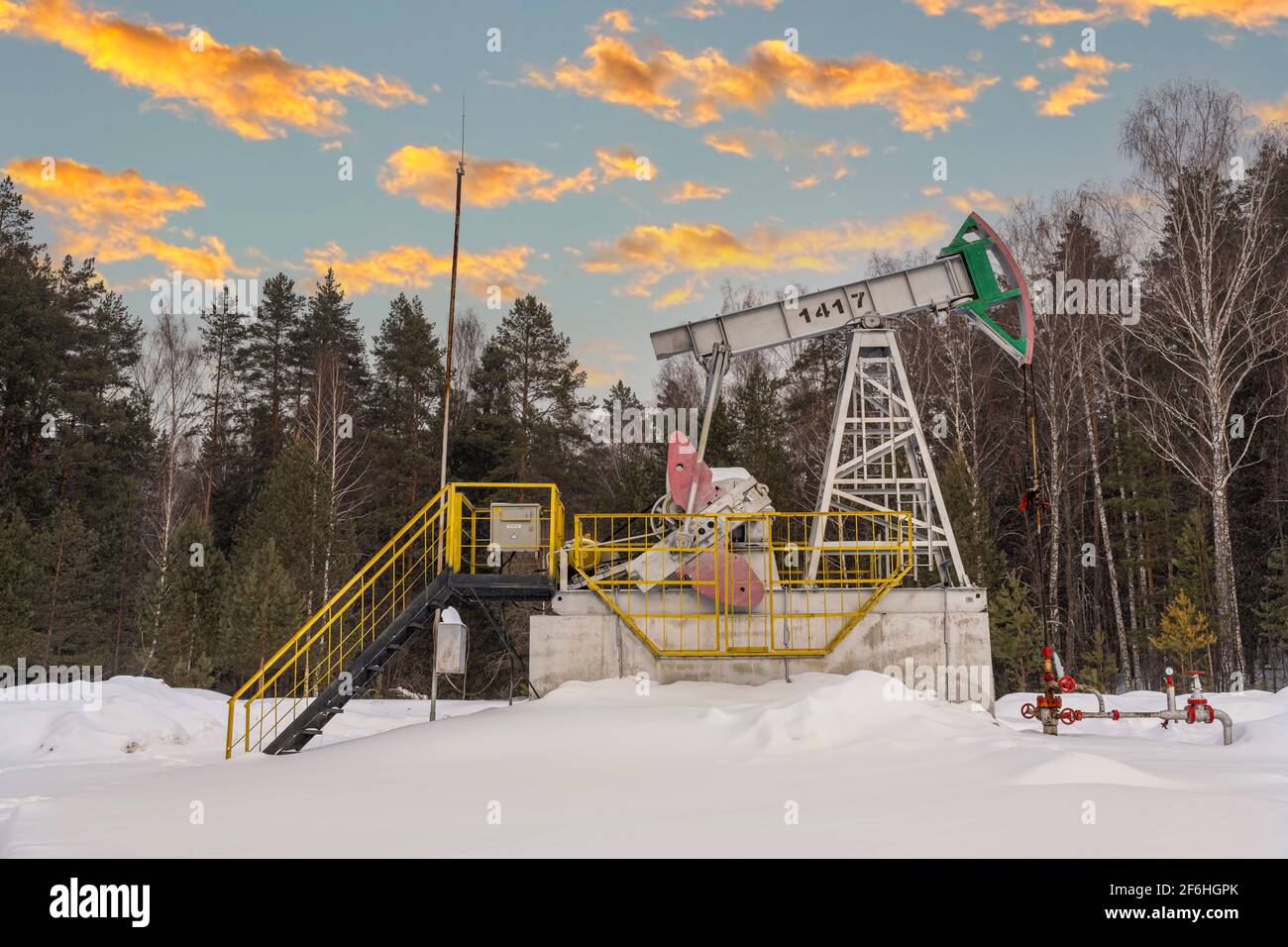 Oil pump rig. Oil and gas production. Oilfield site. Pump Jack are