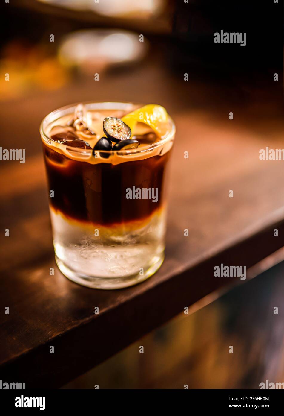 Colorful vodka and rum cocktails served in Mason Jars or a glass