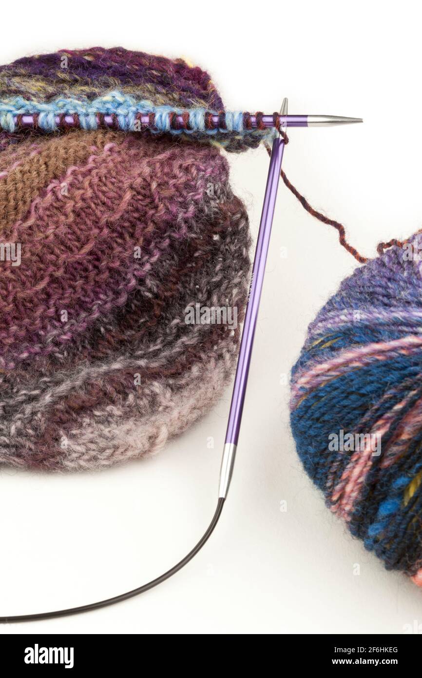 Knitting using  circular needles and yarn Stock Photo