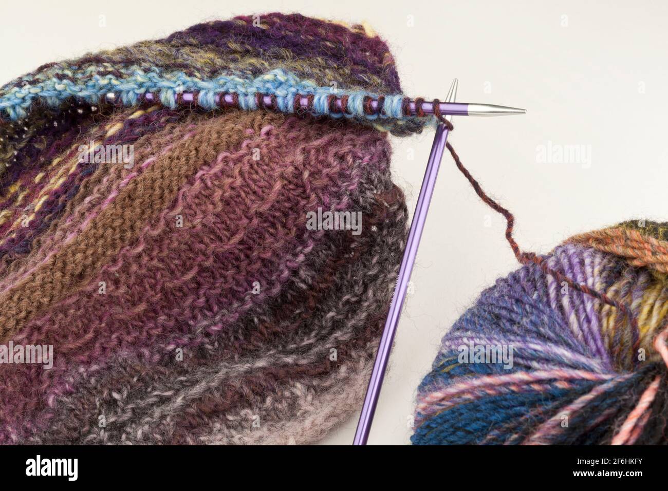 Knitting using  circular needles and yarn Stock Photo
