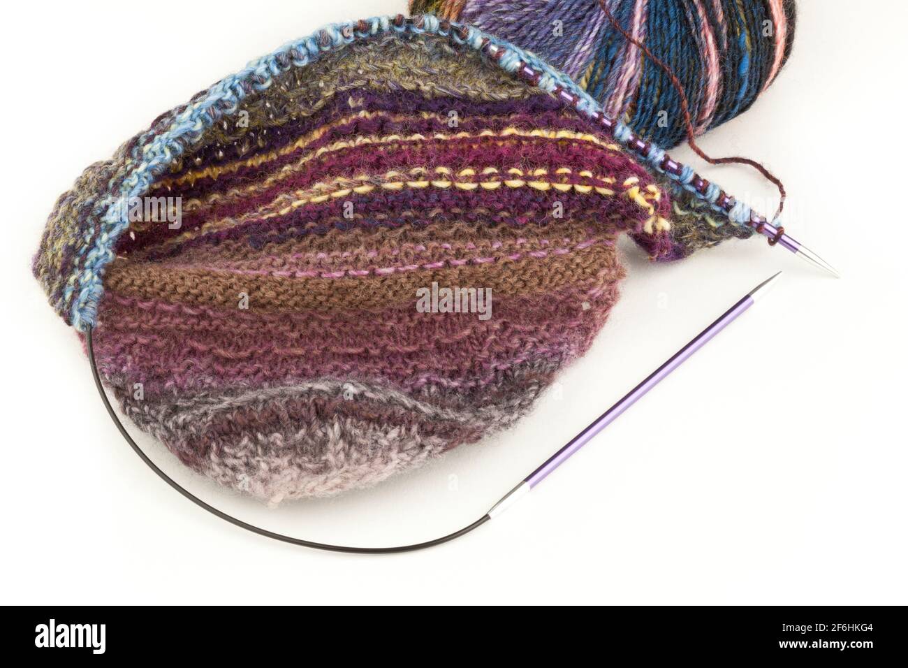 Knitting using circular needles and yarn Stock Photo Alamy