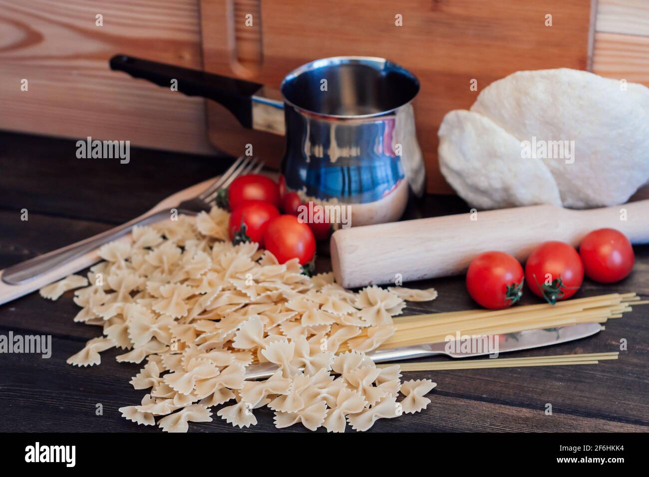 Italian pasta kitchen cooking wood table ingredients Stock Photo Alamy