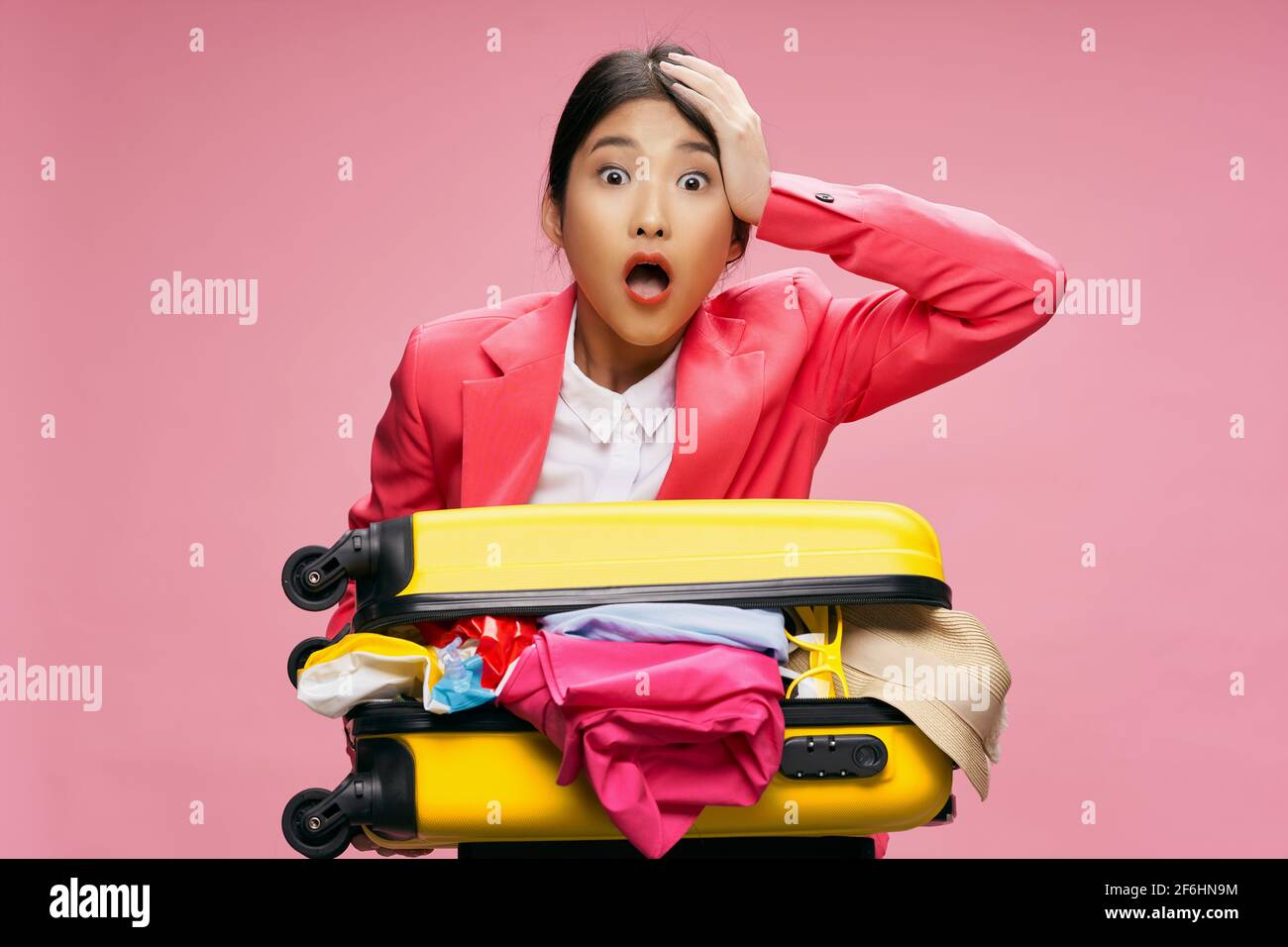 emotional woman suitcase with clothes emotions luggage passenger Stock