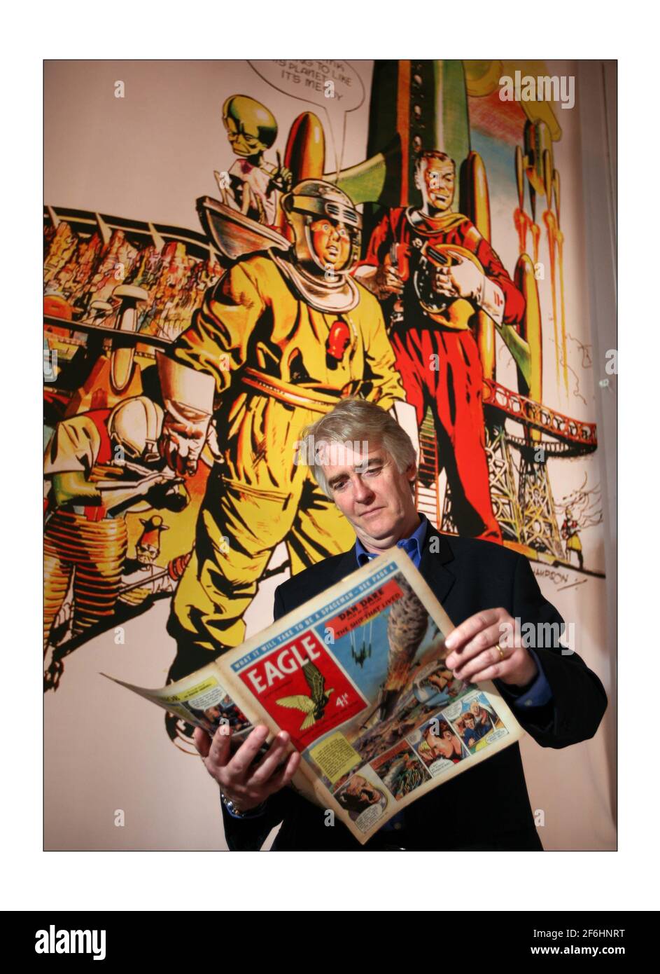 Science Museum exhibition reveals Britains post war technology revolution.... 30 April to 25 October Dan Dare and the Birth of Hi-Tech Britain...  Peter Hampson, son of Dan Dare artist Frank Hampson with one of the drawings that his father used his son as his inspiration. photograph by David Sandison The Independent Stock Photo