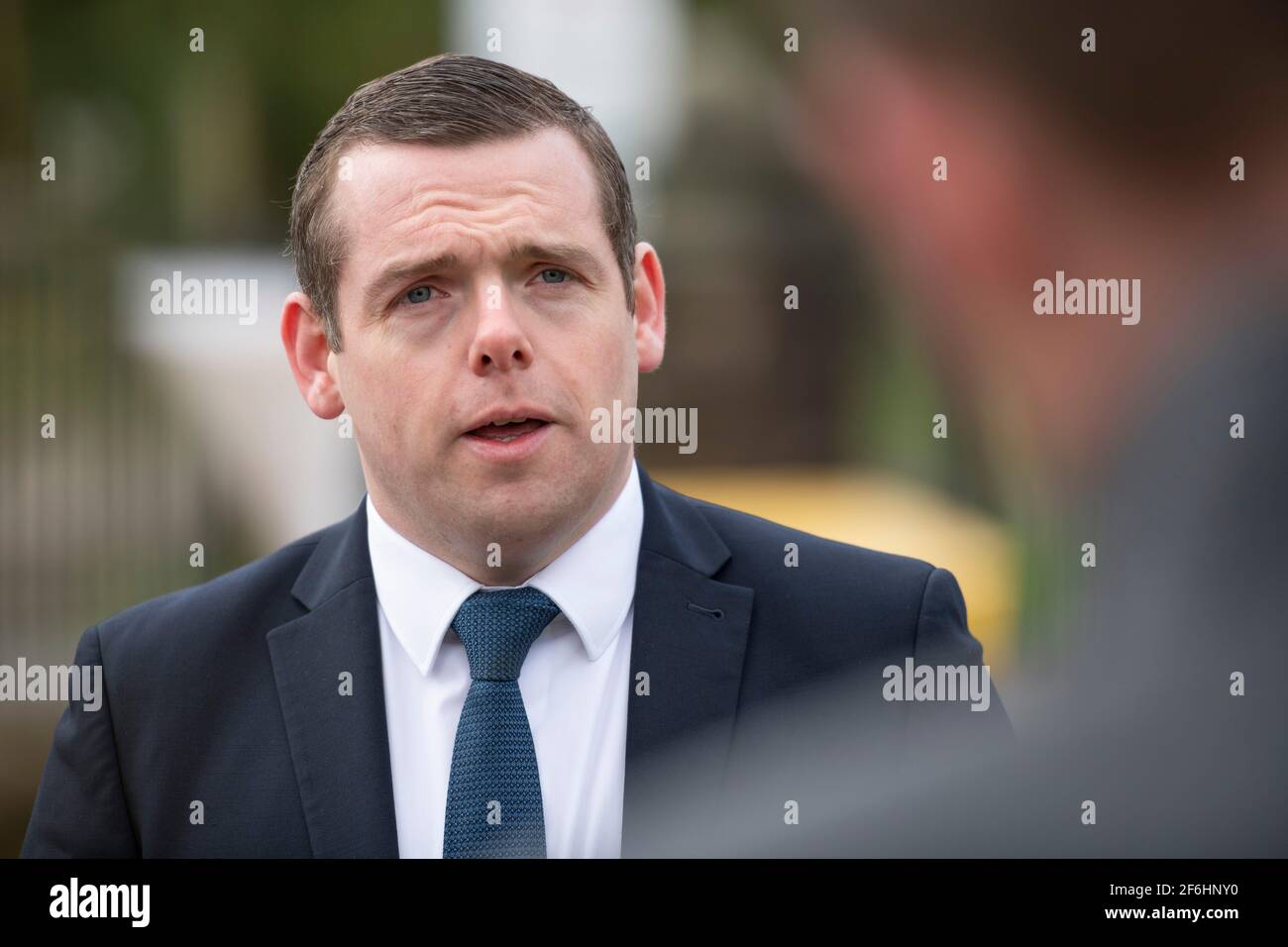 Glasgow, Scotland, UK. 1st Apr, 2021. PICTURED: Douglas Ross MP. Douglas Ross will meets candidate and GP Sandesh Gulhane to unveil a banner on the vaccine rollout and announce the party's NHS spending pledges. Pic Credit: Colin Fisher/Alamy Live News Stock Photo