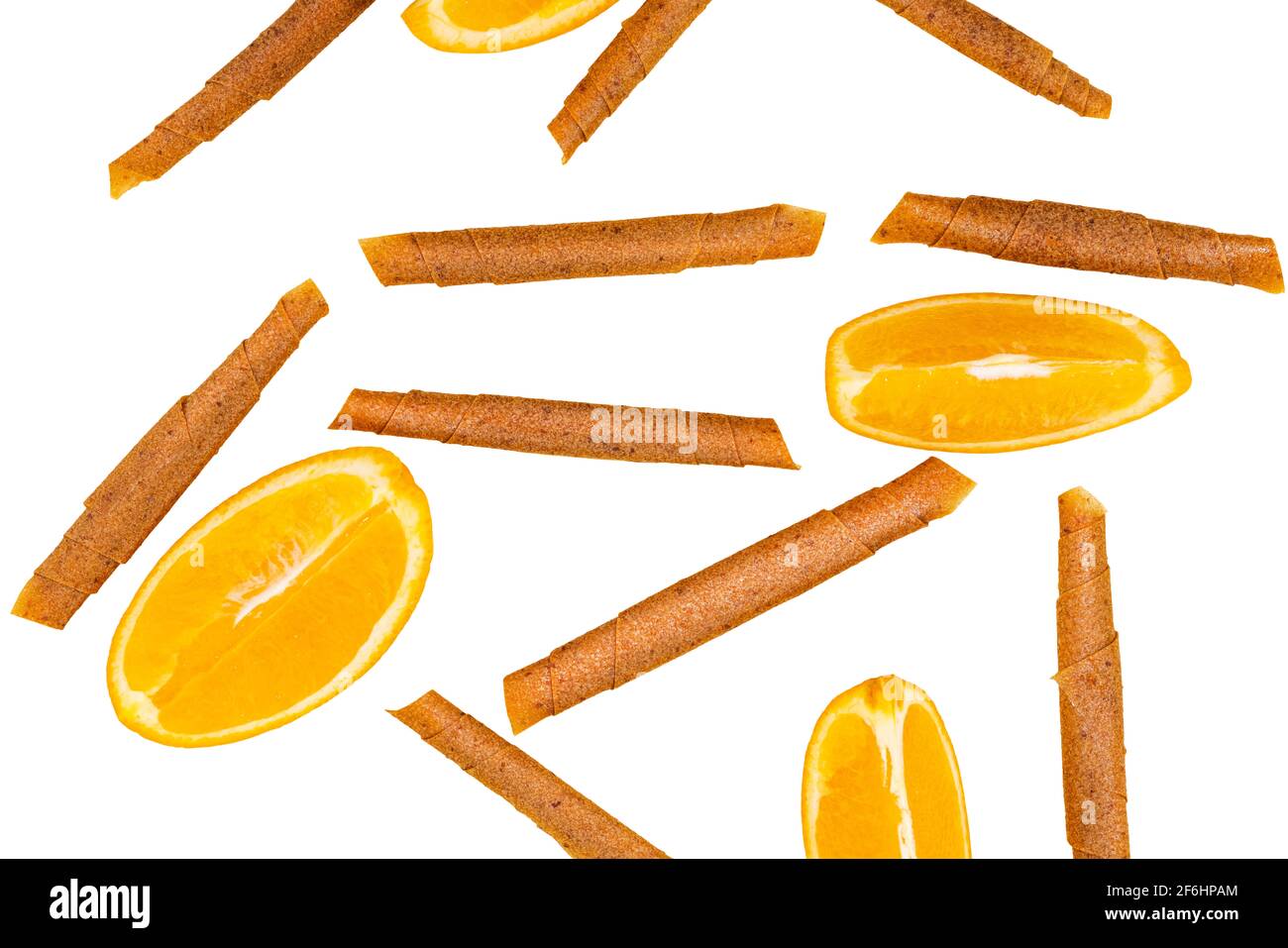 fruit roll up with orange top view, isolated on white. Pattern of fruit pastille. Vegan homemade