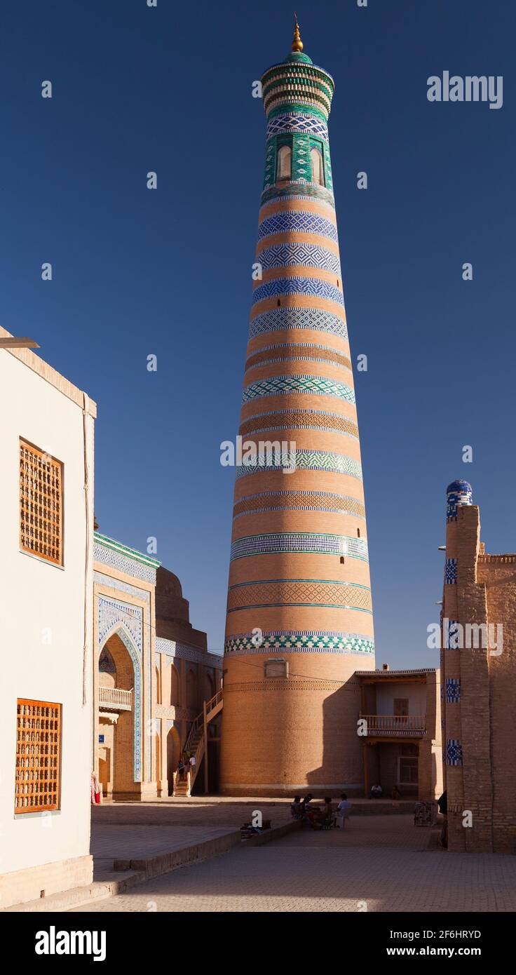 Islom hoja (Islam Xoja) minaret in Itchan Kala (Ichon Qala) - Khiva (Chiva, Heva, Xiva, Chiwa, Khiveh) - Xorazm Province - Uzbekistan - Town on the si Stock Photo