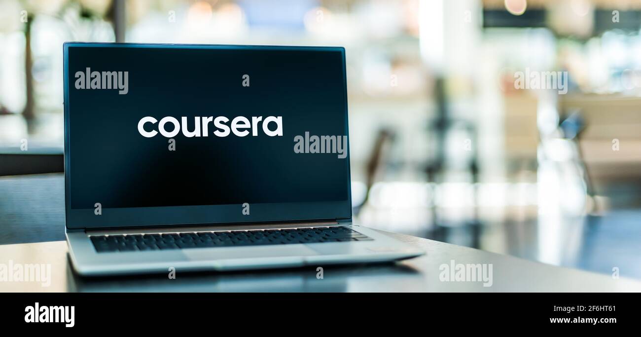 POZNAN, POL - FEB 6, 2021: Laptop computer displaying logo of Coursera, an American massive open online course provider Stock Photo