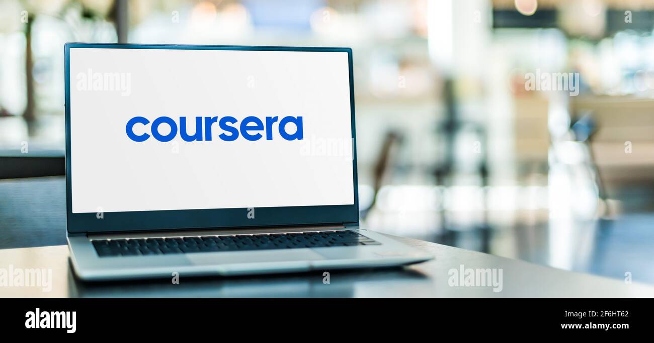 POZNAN, POL - FEB 6, 2021: Laptop computer displaying logo of Coursera, an American massive open online course provider Stock Photo