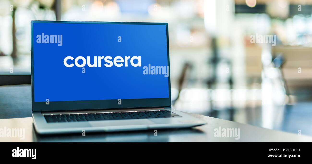 POZNAN, POL - FEB 6, 2021: Laptop computer displaying logo of Coursera, an American massive open online course provider Stock Photo