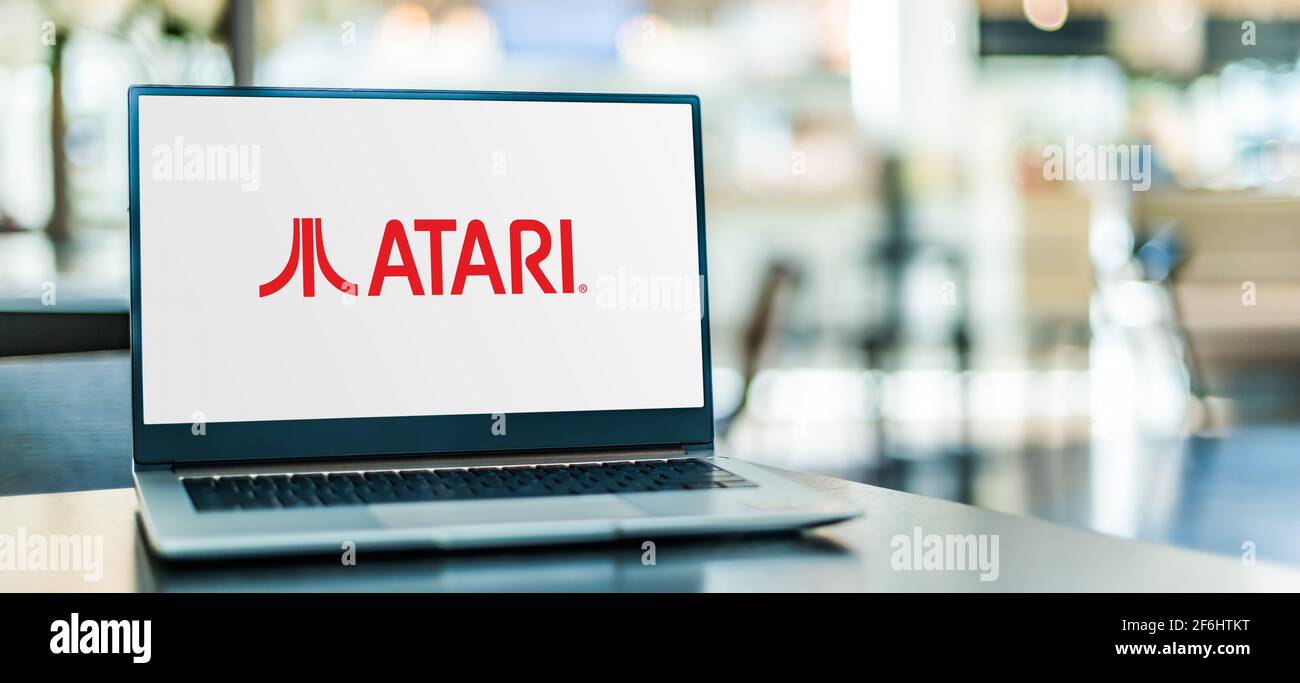 POZNAN, POL - MAR 15, 2021: Laptop computer displaying logo of Atari, a video games and consumer electronics brand name owned currently by Atari Inter Stock Photo