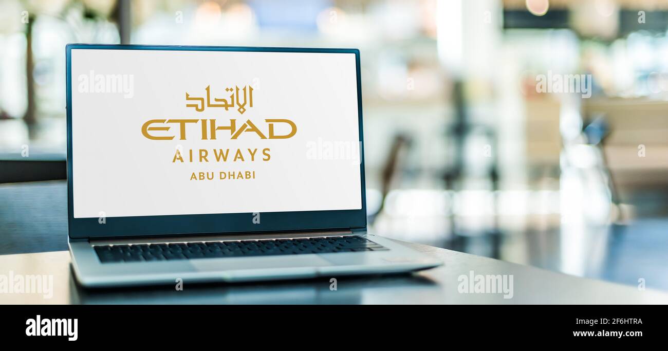 POZNAN, POL MAR 15, 2021 Laptop computer displaying logo of Etihad Airways headquartered in