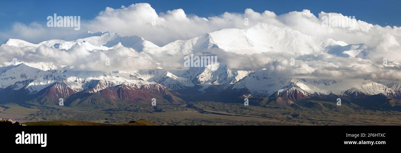 Panoramic view of Lenin Peak from Alay range - Kyrgyz Pamir Mountains - Kyrgyzstan and Tajikistan border- Central Asia 'Roof of the World' Stock Photo