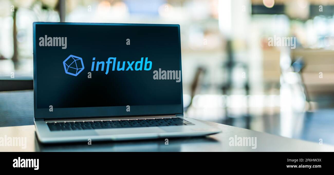 POZNAN, POL - MAR 15, 2021: Laptop computer displaying logo of InfluxDB, an open-source time series database (TSDB) developed by InfluxData Stock Photo