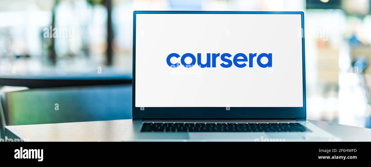 POZNAN, POL - FEB 6, 2021: Laptop computer displaying logo of Coursera, an American massive open online course provider Stock Photo