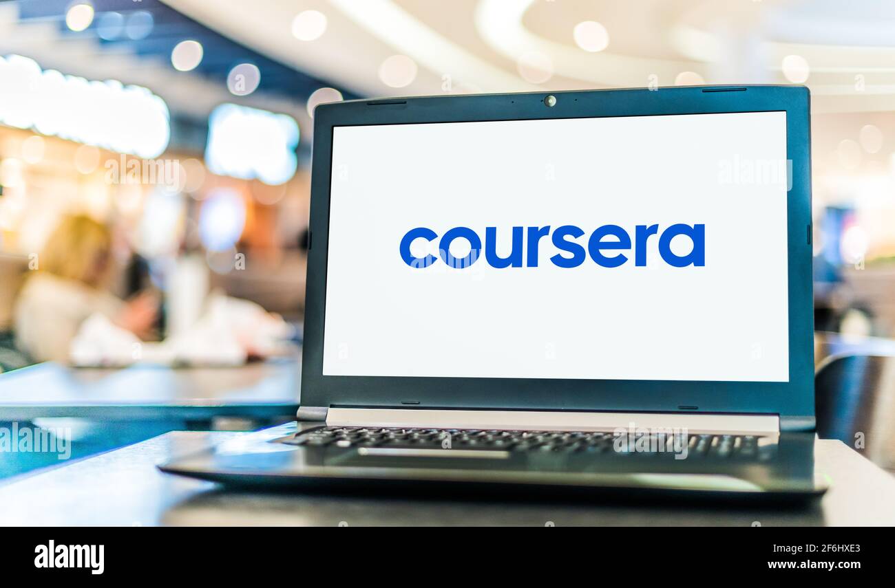 POZNAN, POL - FEB 6, 2021: Laptop computer displaying logo of Coursera, an American massive open online course provider Stock Photo