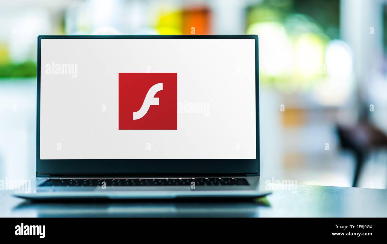 POZNAN, POL NOV 12, 2020 Laptop computer displaying logo of Adobe