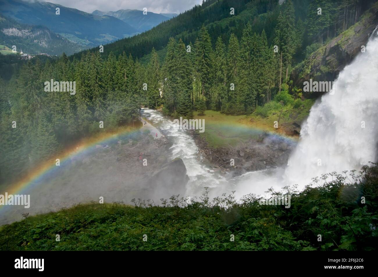 Morning Rainbow At Krimml Falls In The High Tauern National Park in Salzburg Austria Stock Photo