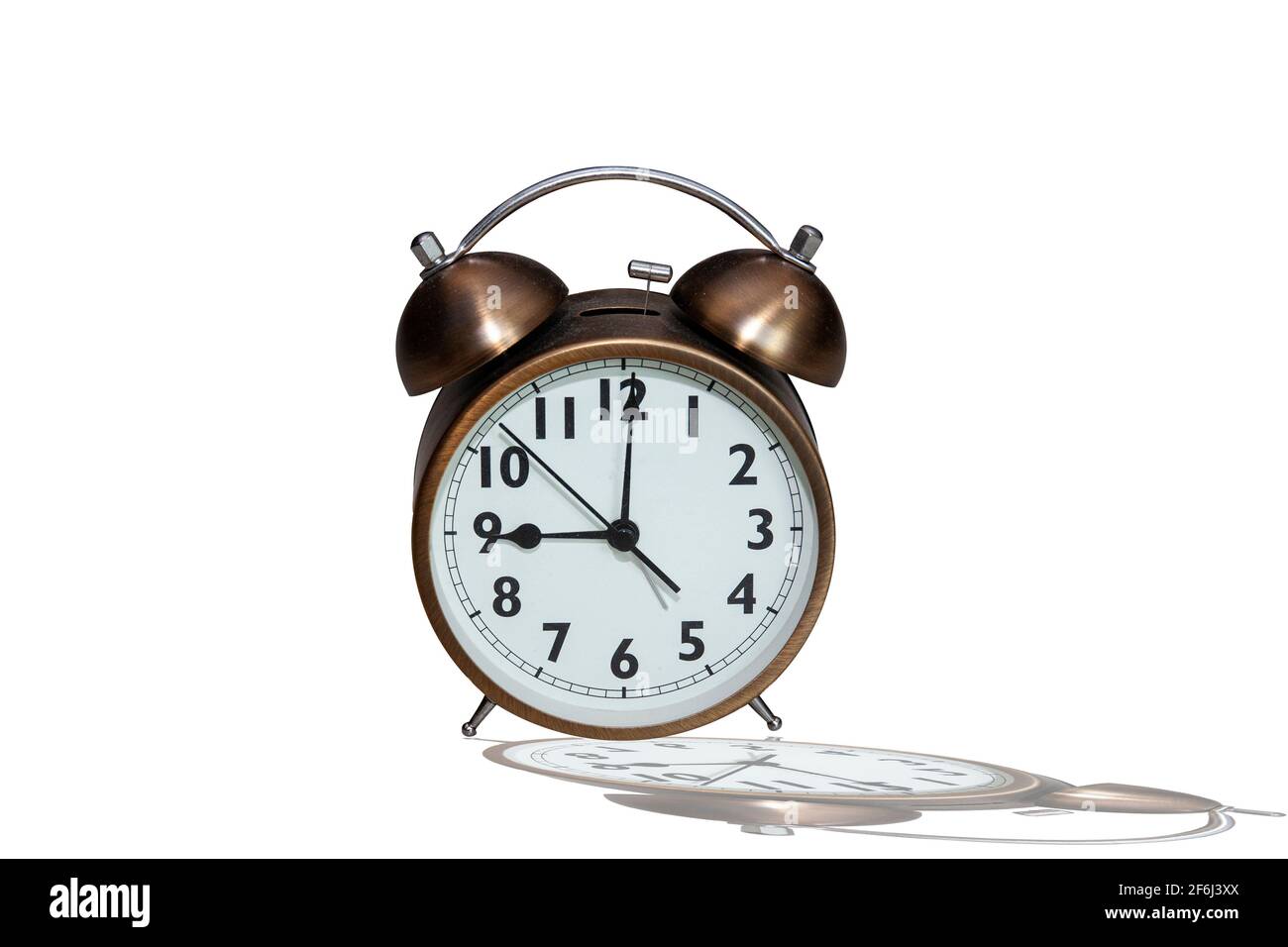 an alarm clock indicating 9 o'clock rush hour Stock Photo