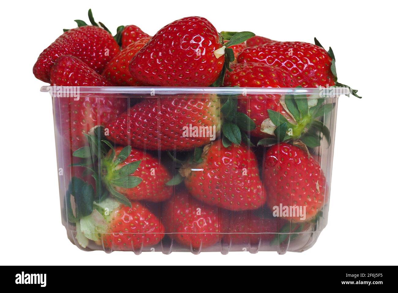 strawberries in a basket isolated over white background Stock Photo - Alamy
