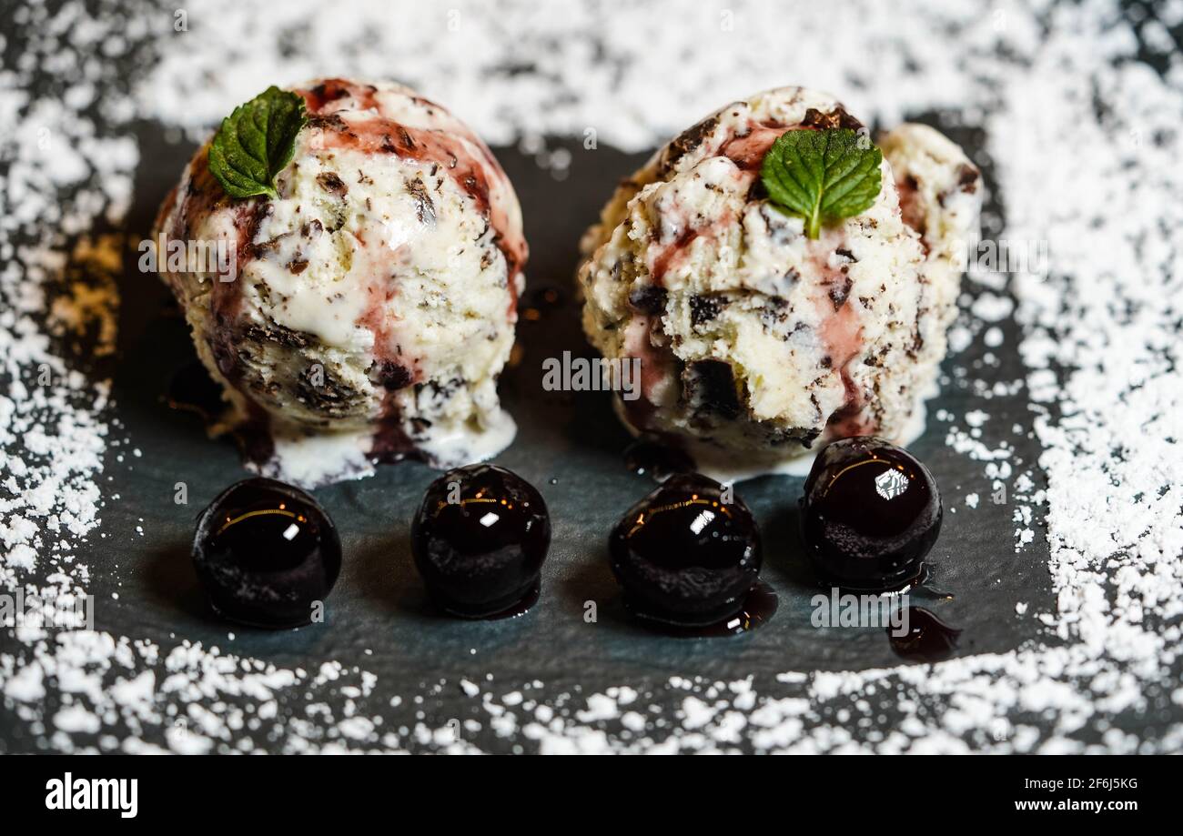 Stracciatella italian icecream with dark chocolate and Cherries Stock Photo