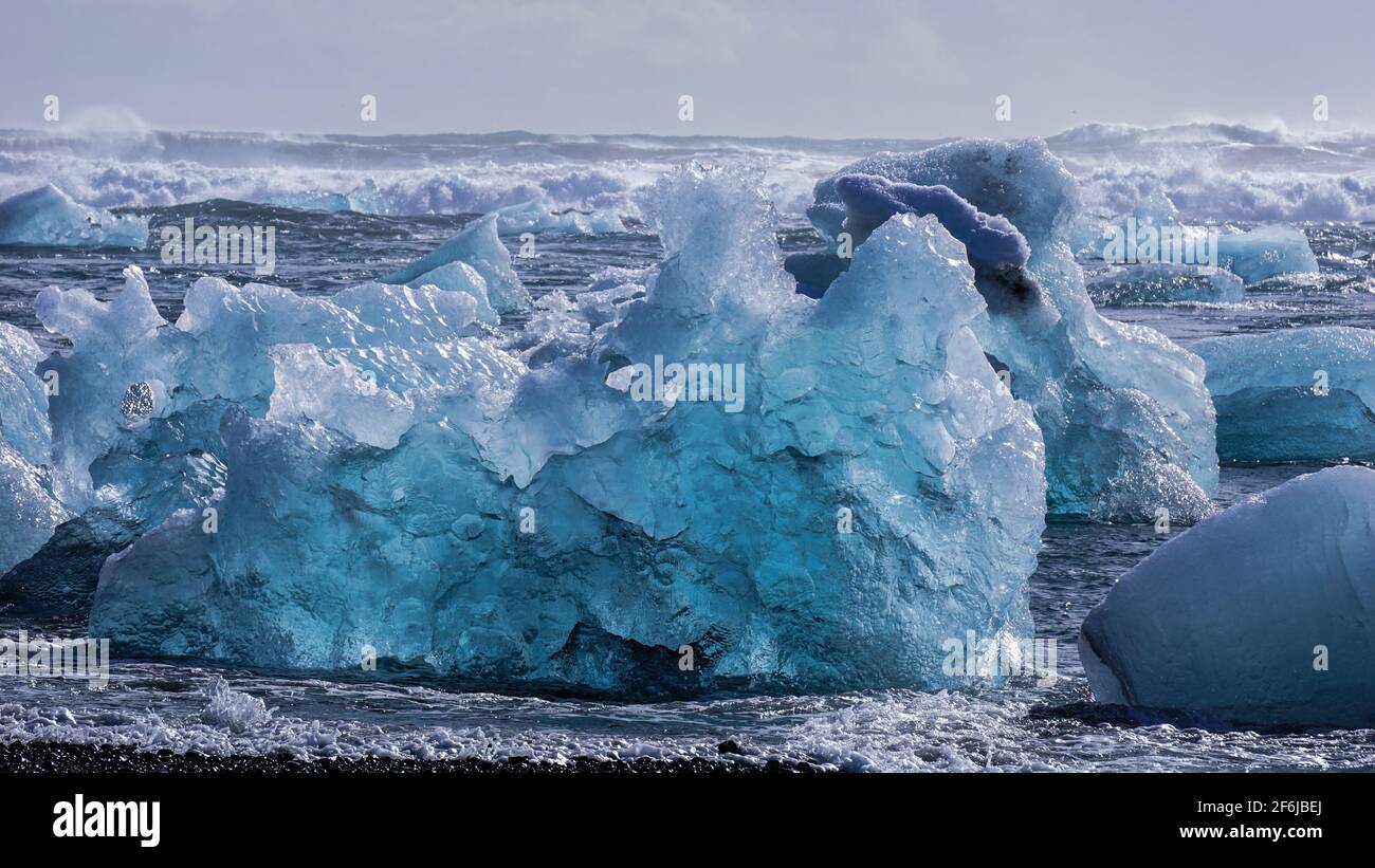 Melting ice on the Diamaond Beach near Jökulsárlón Glacier Lagoon in ...