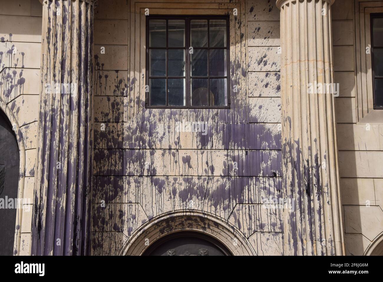 London, United Kingdom. 1st April 2021. Extinction Rebellion activists covered the Bank Of England in fake oil as part of nationwide 'Money Rebellion' protests targeting banks over, the activists say, their role in the climate and ecological crisis. Stock Photo