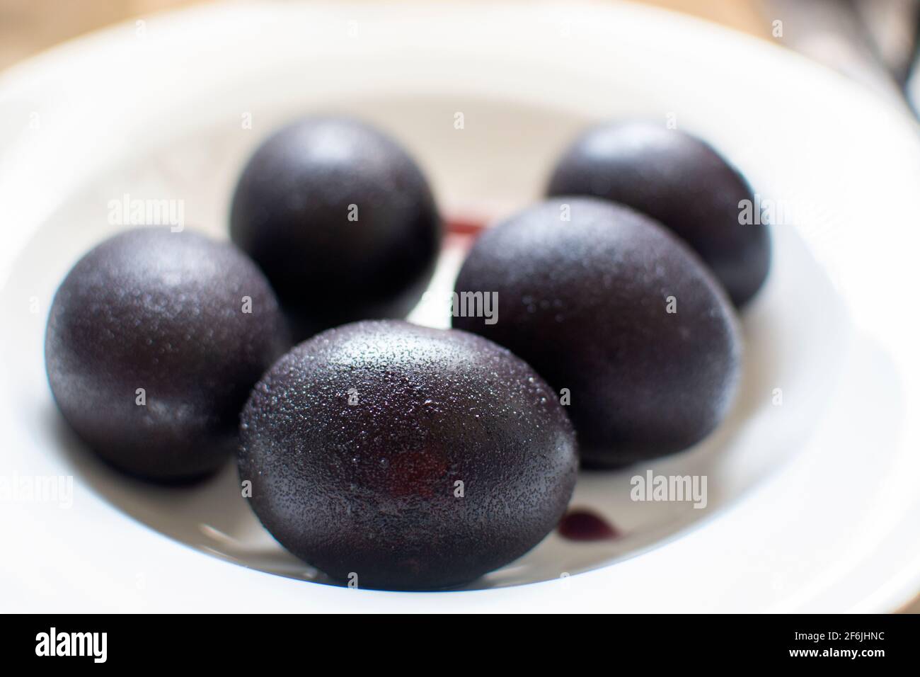 Easter eggs colored in red wine Stock Photo Alamy