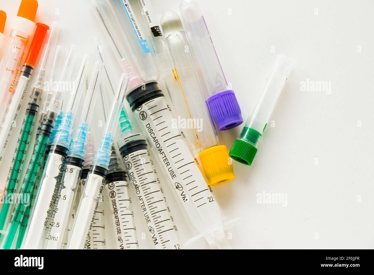 Set of medical empty needles, big and insulin needles on the white  background, injection and vaccine Stock Photo - Alamy