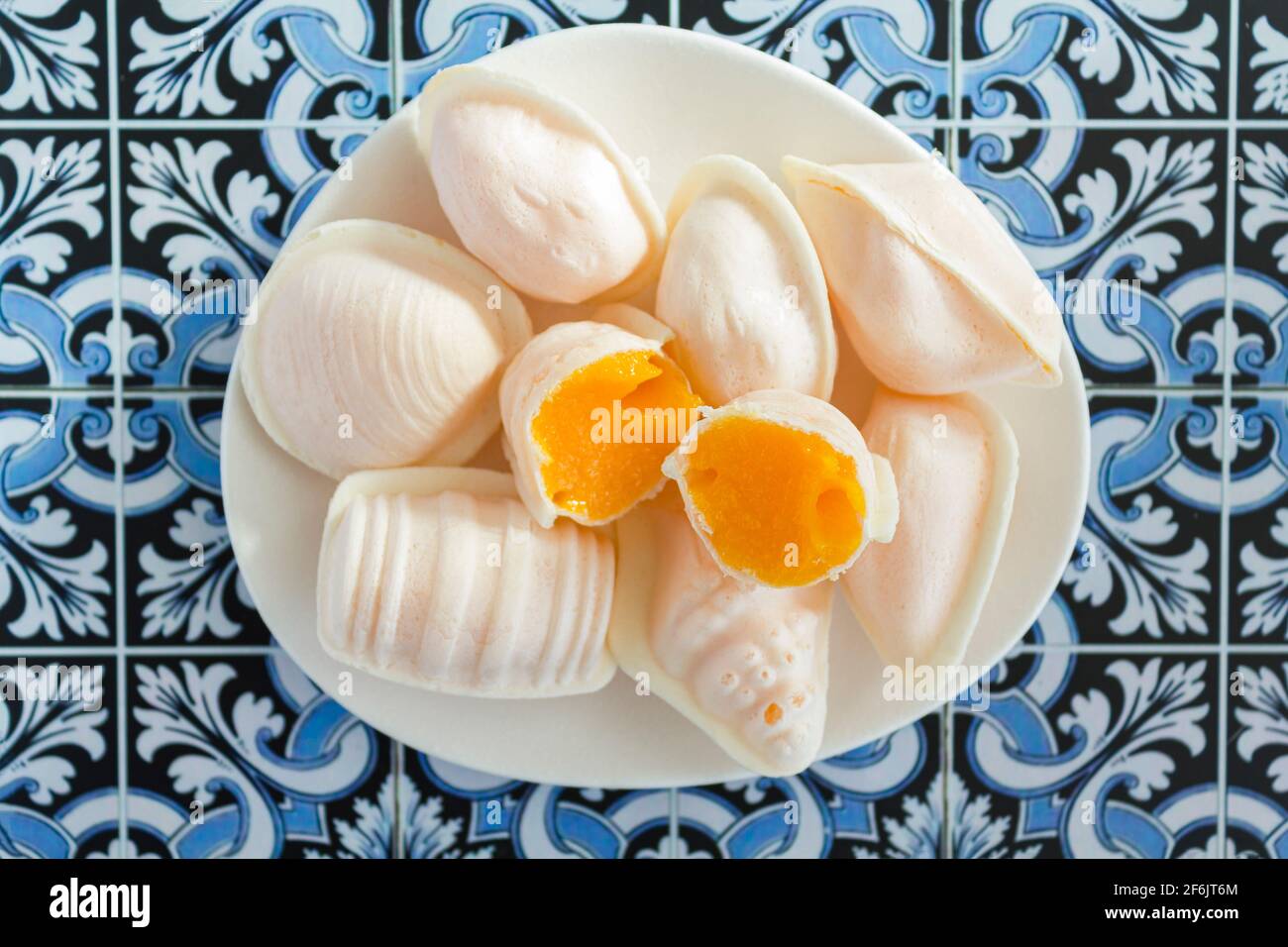 Top view of traditional portuguese egg yolk sweets called Ovos Moles de