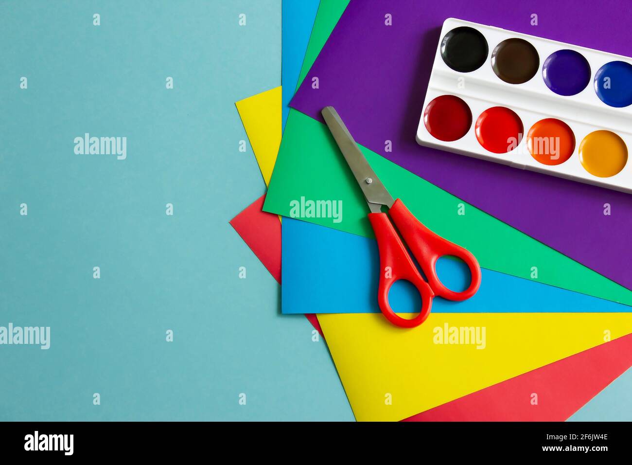 Set for children's craft diy from colored cardboard, paper, scissors and  pencils. Template for banner with space for text Stock Photo - Alamy