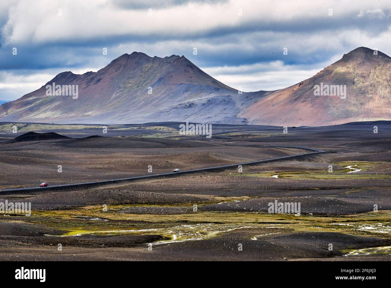 Travelling in a barren landscape. Iceland Stock Photo