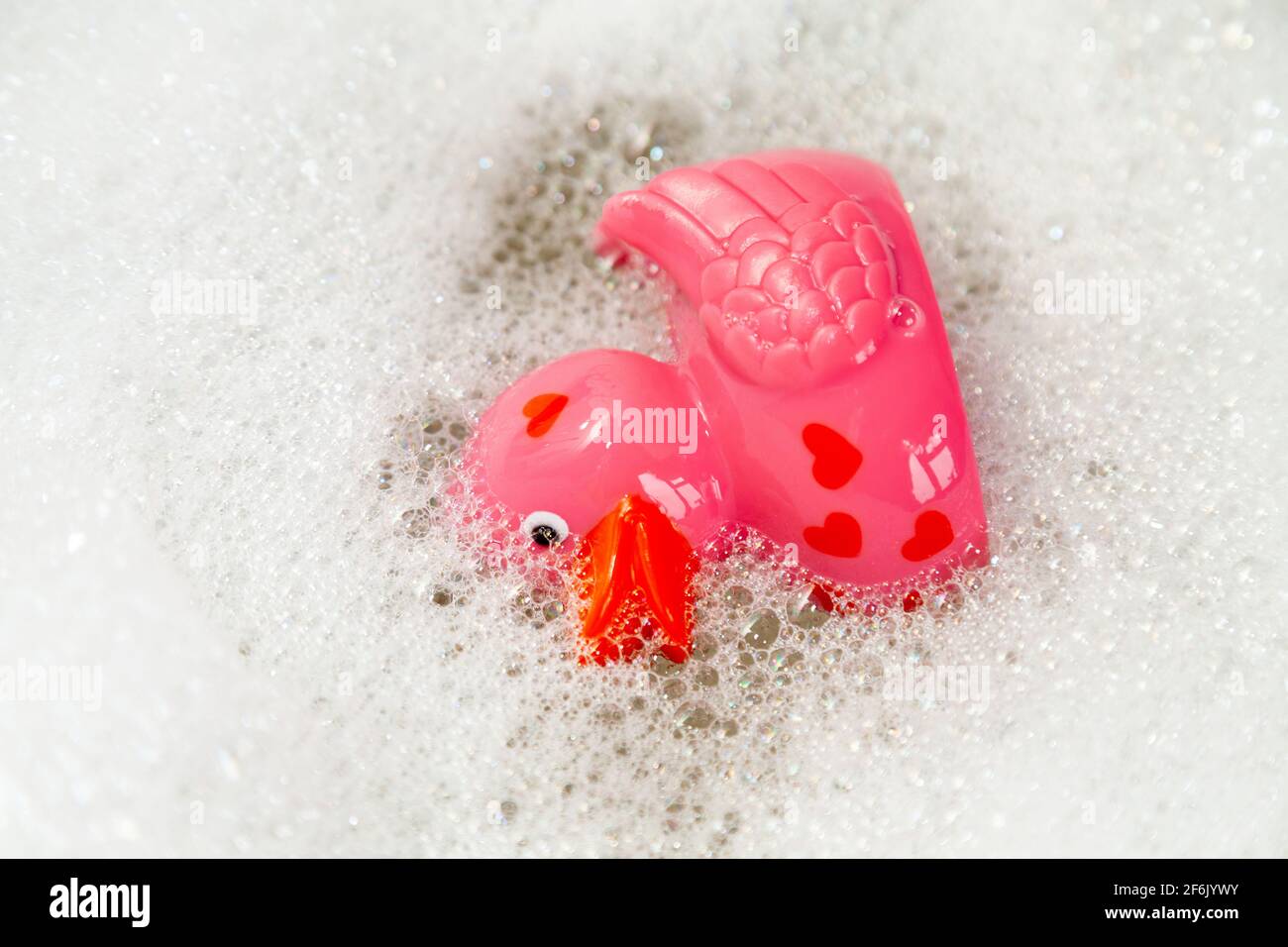 Rubber duck in bubble bath Stock Photo Alamy