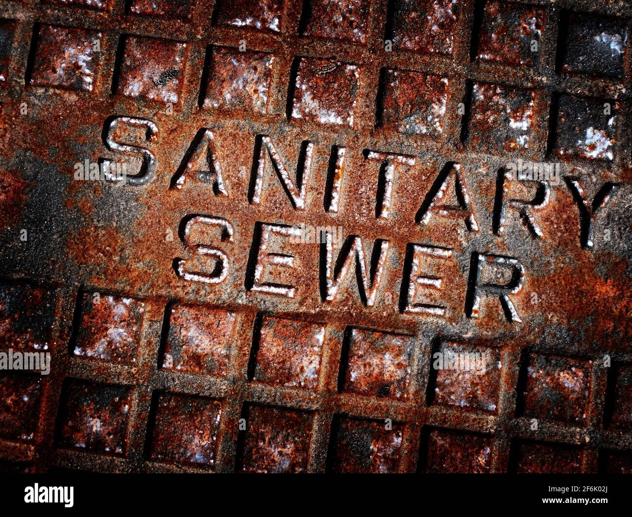 Sewer man hole cover sanitary iron place textured rusted Stock Photo