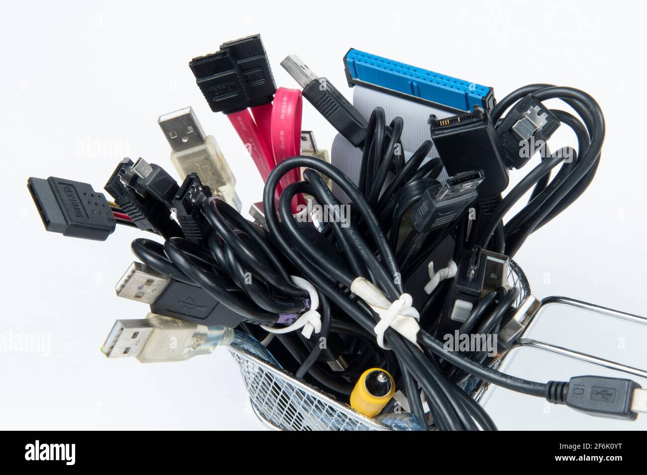 technological waste that remains in residence as computer cables Stock Photo
